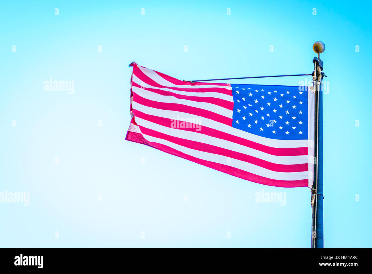 American flag on blue sky Stock Photo - Alamy