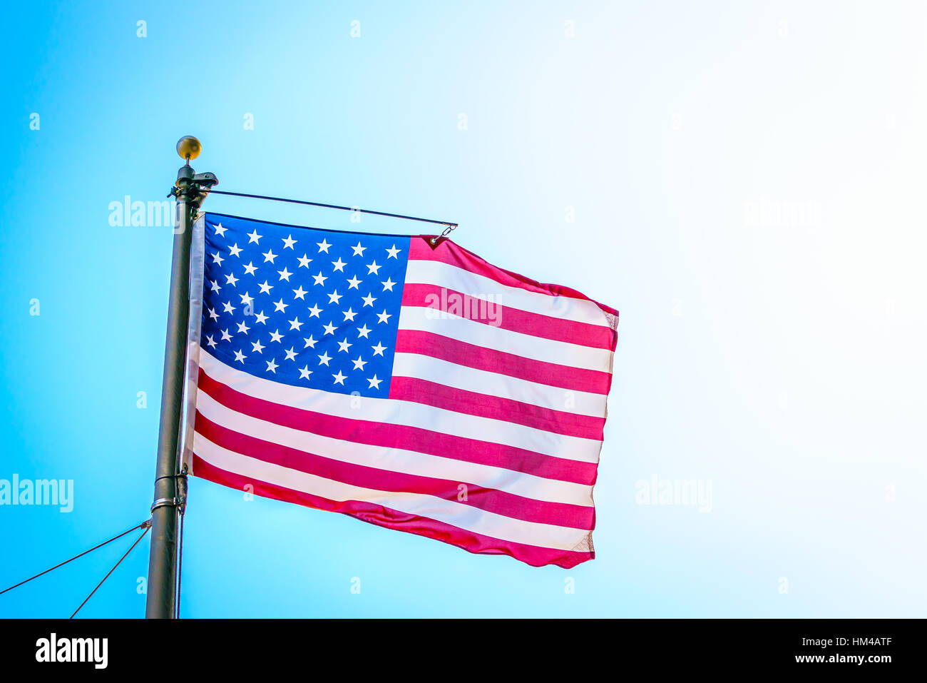 American flag on blue sky Stock Photo - Alamy
