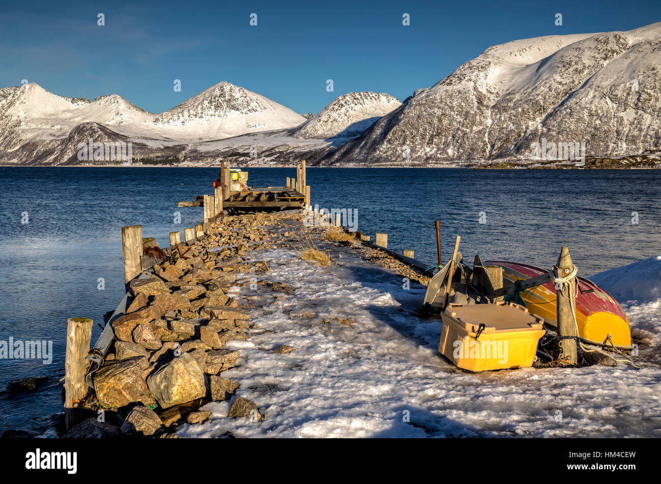 Boat pier in Winter in Northern Norway. Stock Photo