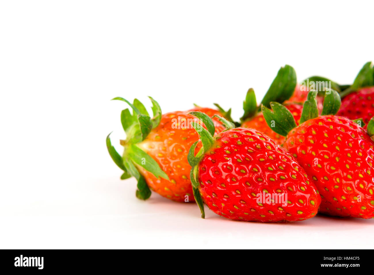 Fresh strawberries isolated on white background Stock Photo - Alamy