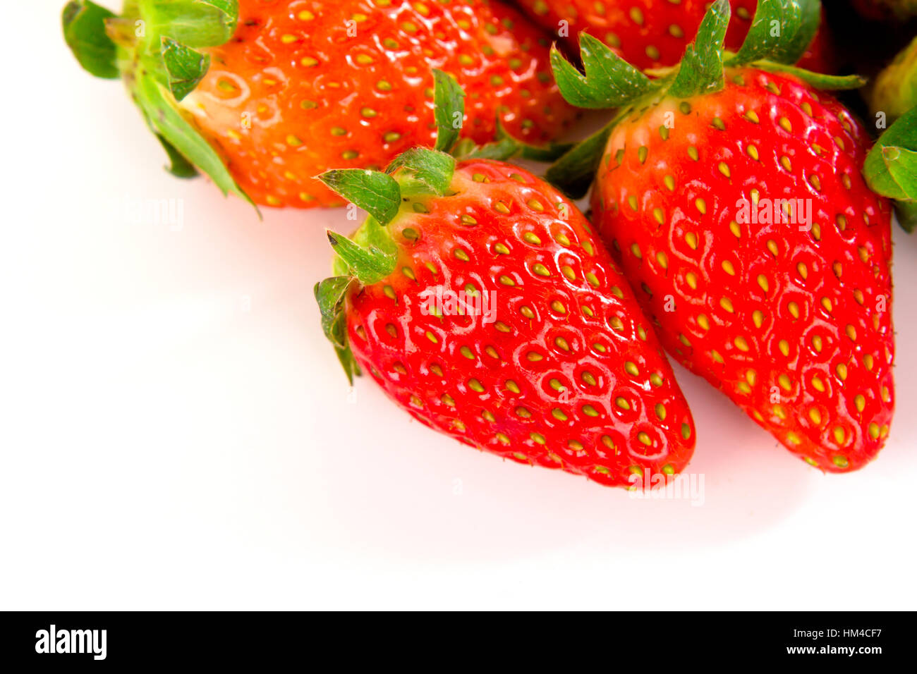 Fresh strawberries isolated on white background Stock Photo - Alamy