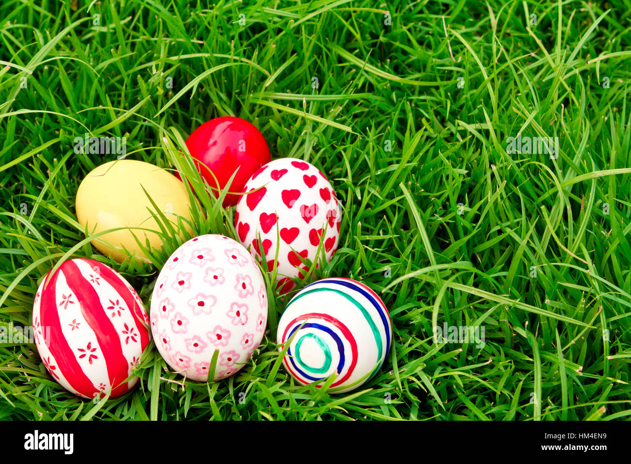 Easter Eggs on Fresh Green Grass Stock Photo - Alamy