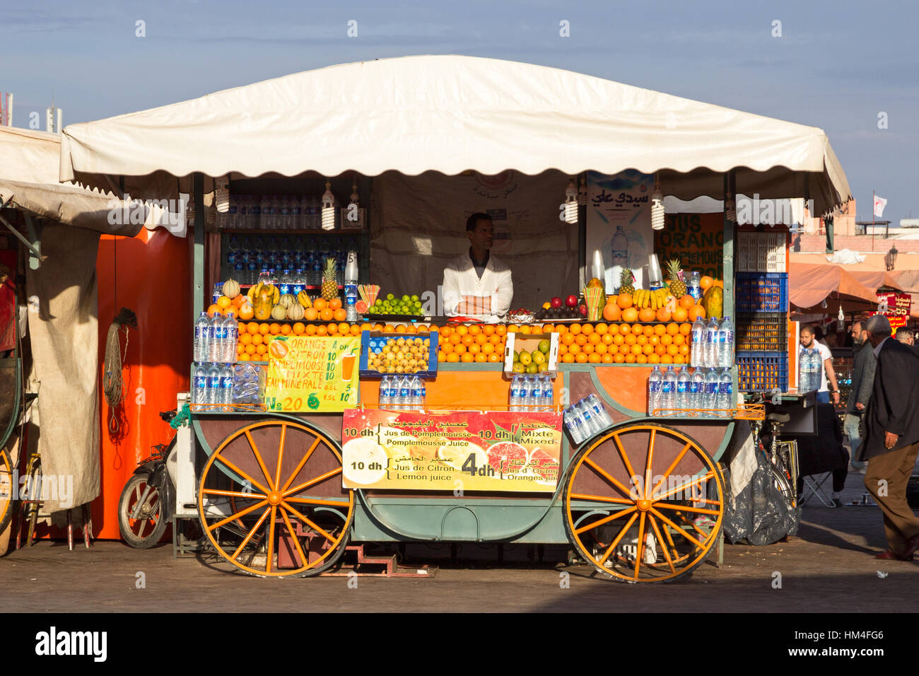 MARRAKECH, MOROCCO - APR 29, 2016: Orange juice stall on the Jamaa el Fna square in Marrakesh. Stock Photo