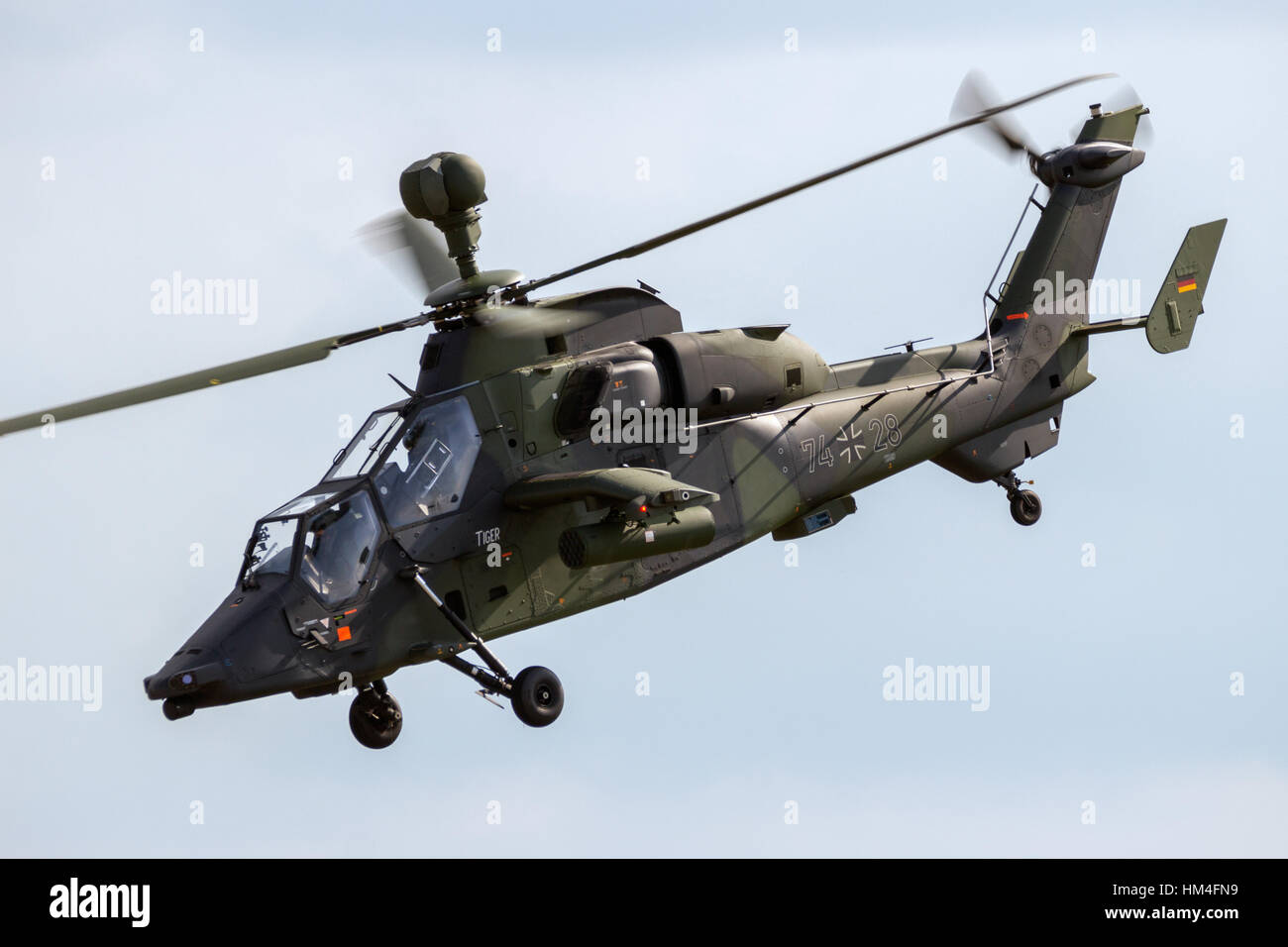BERLIN - JUN 2, 2016: German Army Eurocopter EC665 Tiger attack helicopter flyby during the Berlin Airshow ILA at Berlin-Schoneveld airport Stock Photo