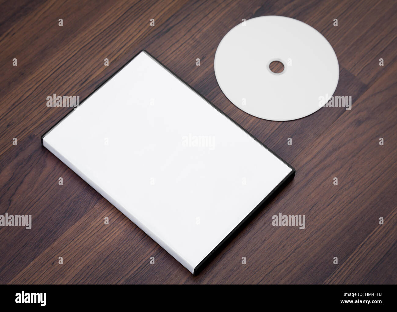 Blank compact disc with cover on wood background ground Stock Photo - Alamy
