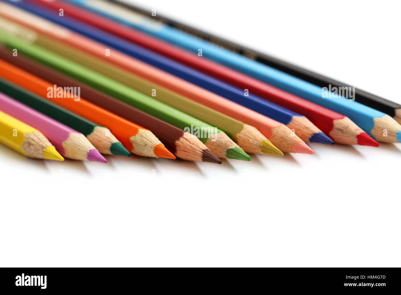 Close up of color pencils against white background Stock Photo