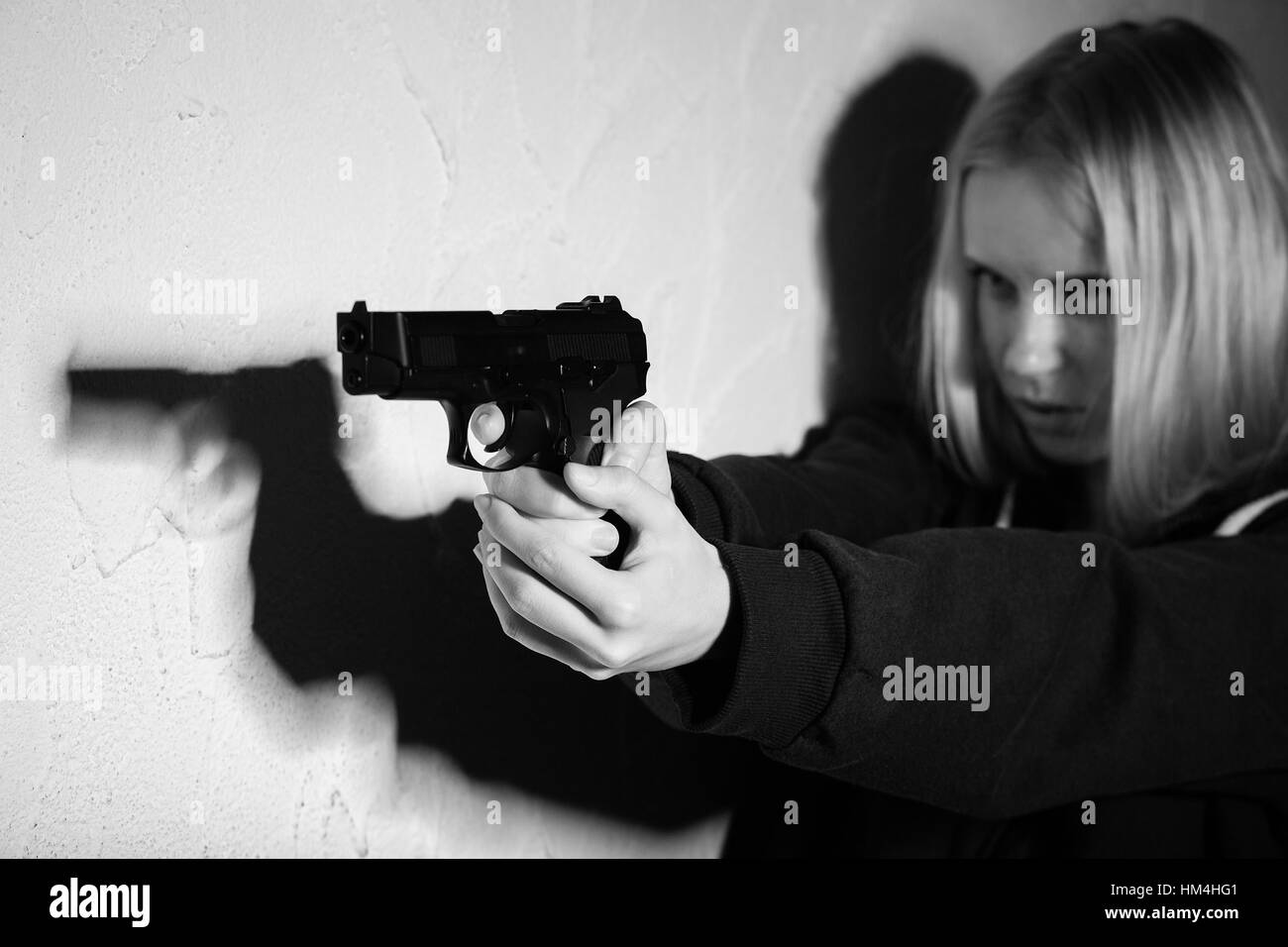 Serious girl gun aiming on hi-res stock photography and images - Alamy