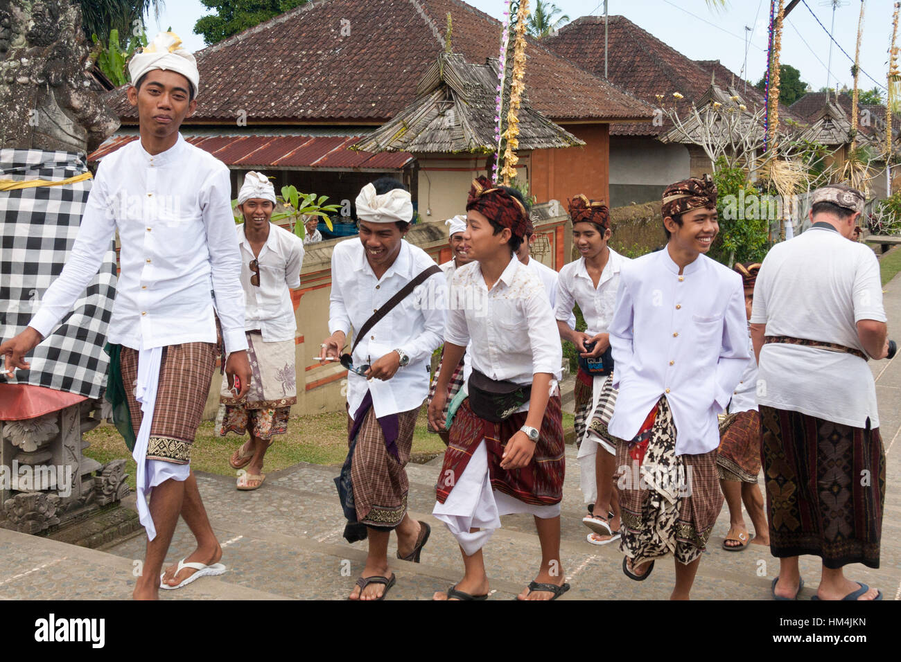 Young boys on their way to the temple during the Galungan festival in Bali, Indonesia Stock Photo