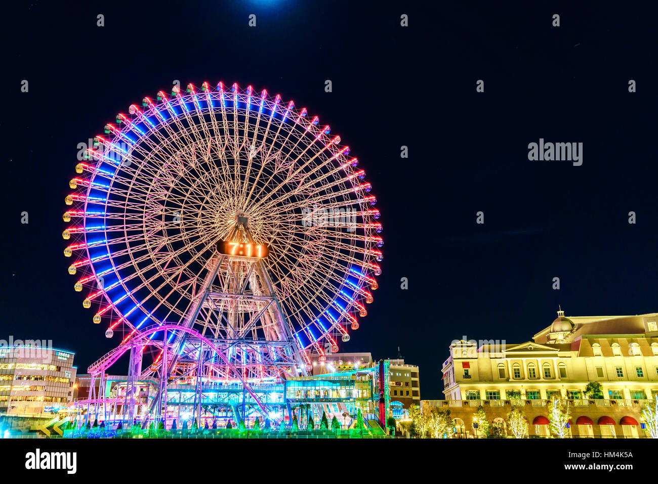 Yokohama,Japan - November 24,2015 : Ferris wheel at cosmo world fun park at minato mirai , Yokohama is the third biggest city in Japan. Stock Photo