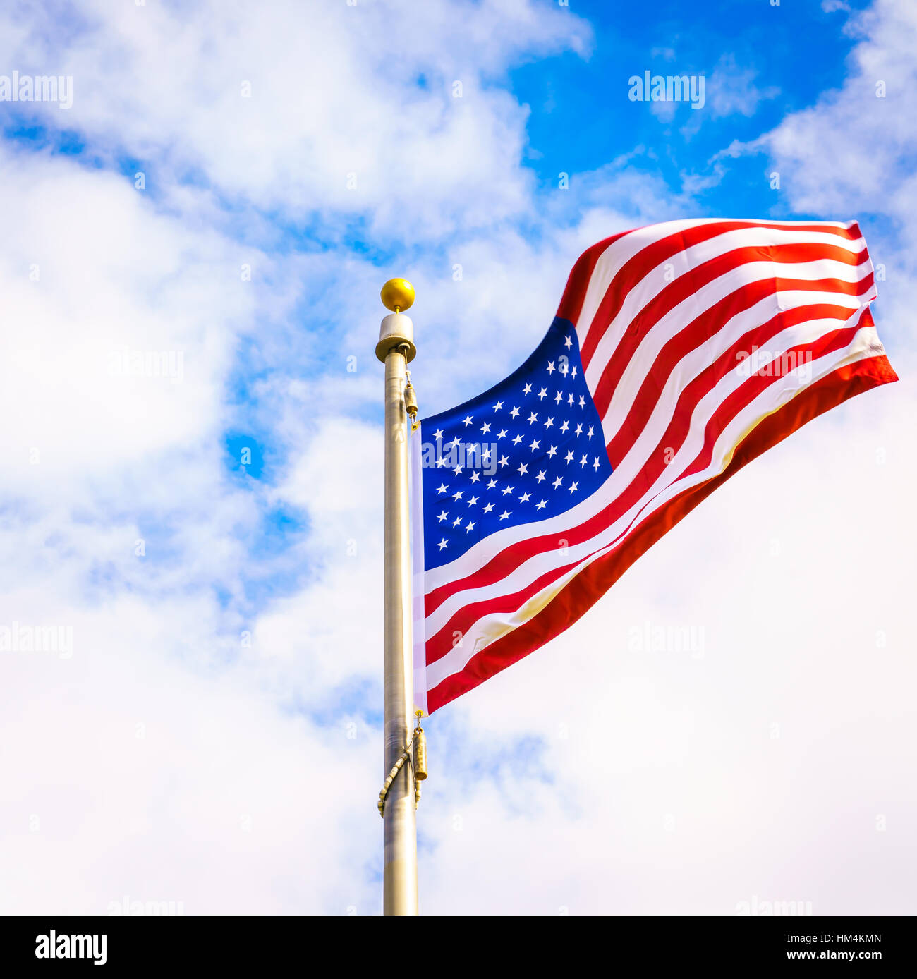 American flag on blue sky Stock Photo - Alamy