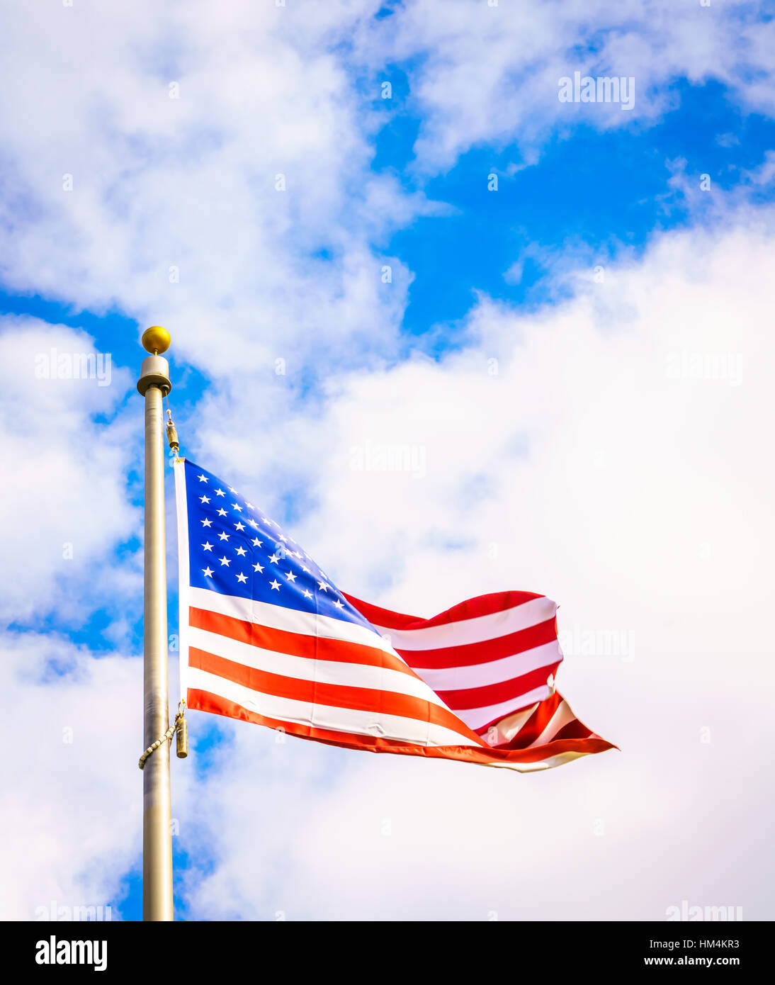 American flag on blue sky Stock Photo - Alamy