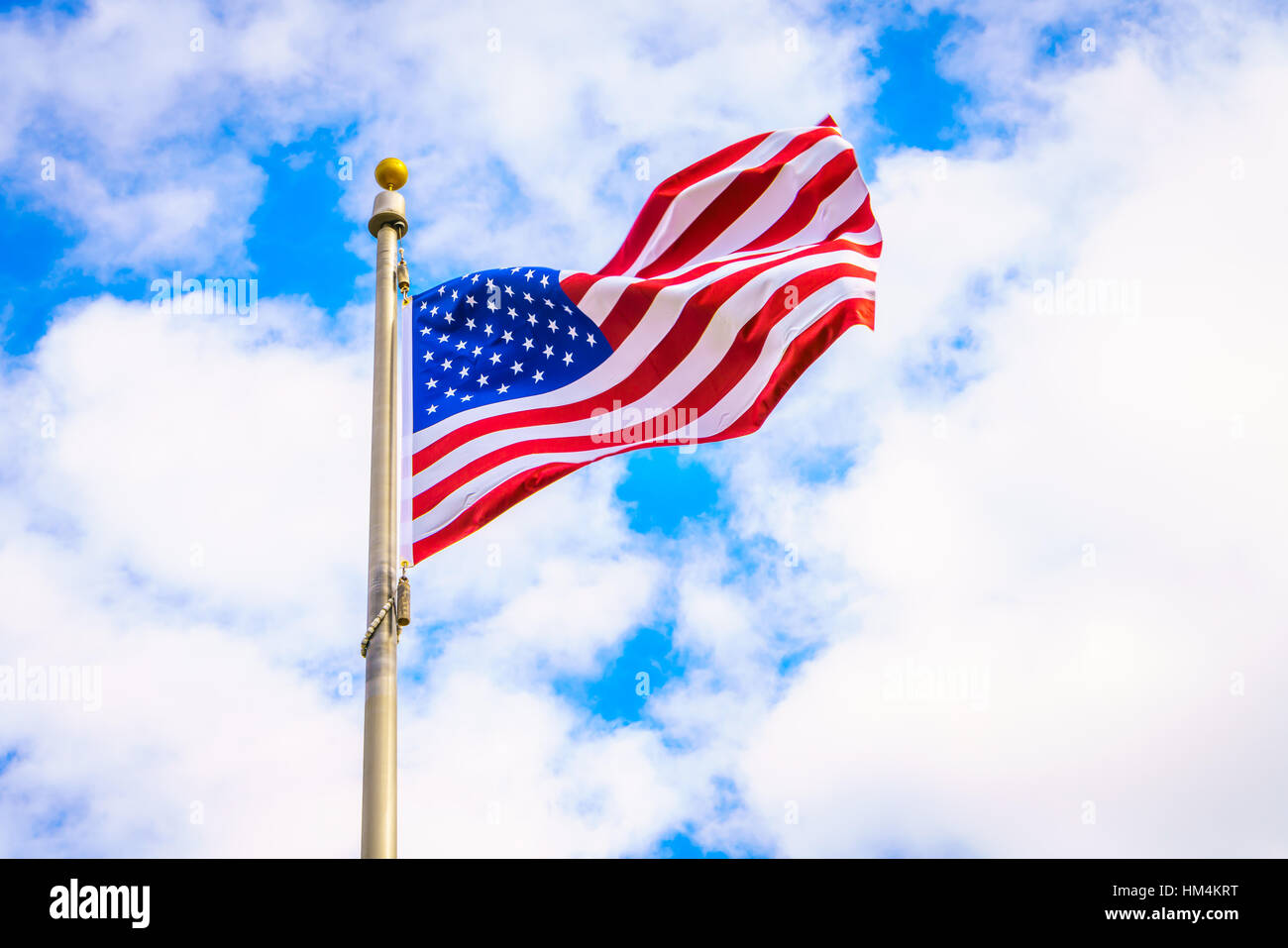 American flag on blue sky Stock Photo - Alamy