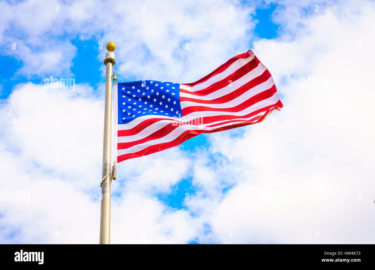American flag on blue sky Stock Photo - Alamy