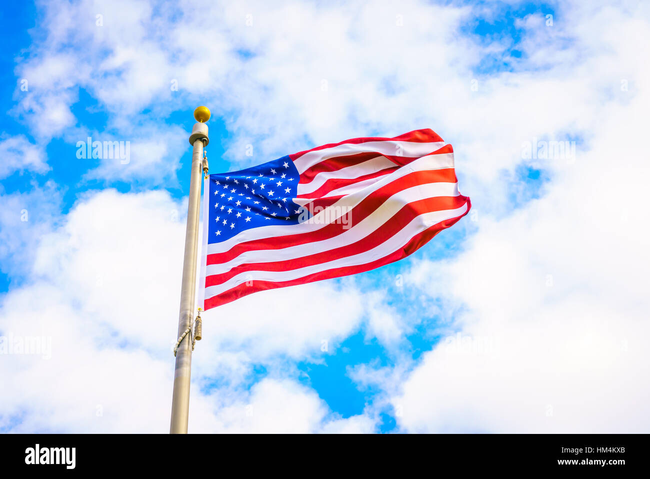 American flag on blue sky Stock Photo - Alamy