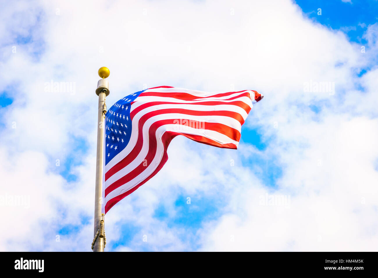 American flag on blue sky Stock Photo - Alamy