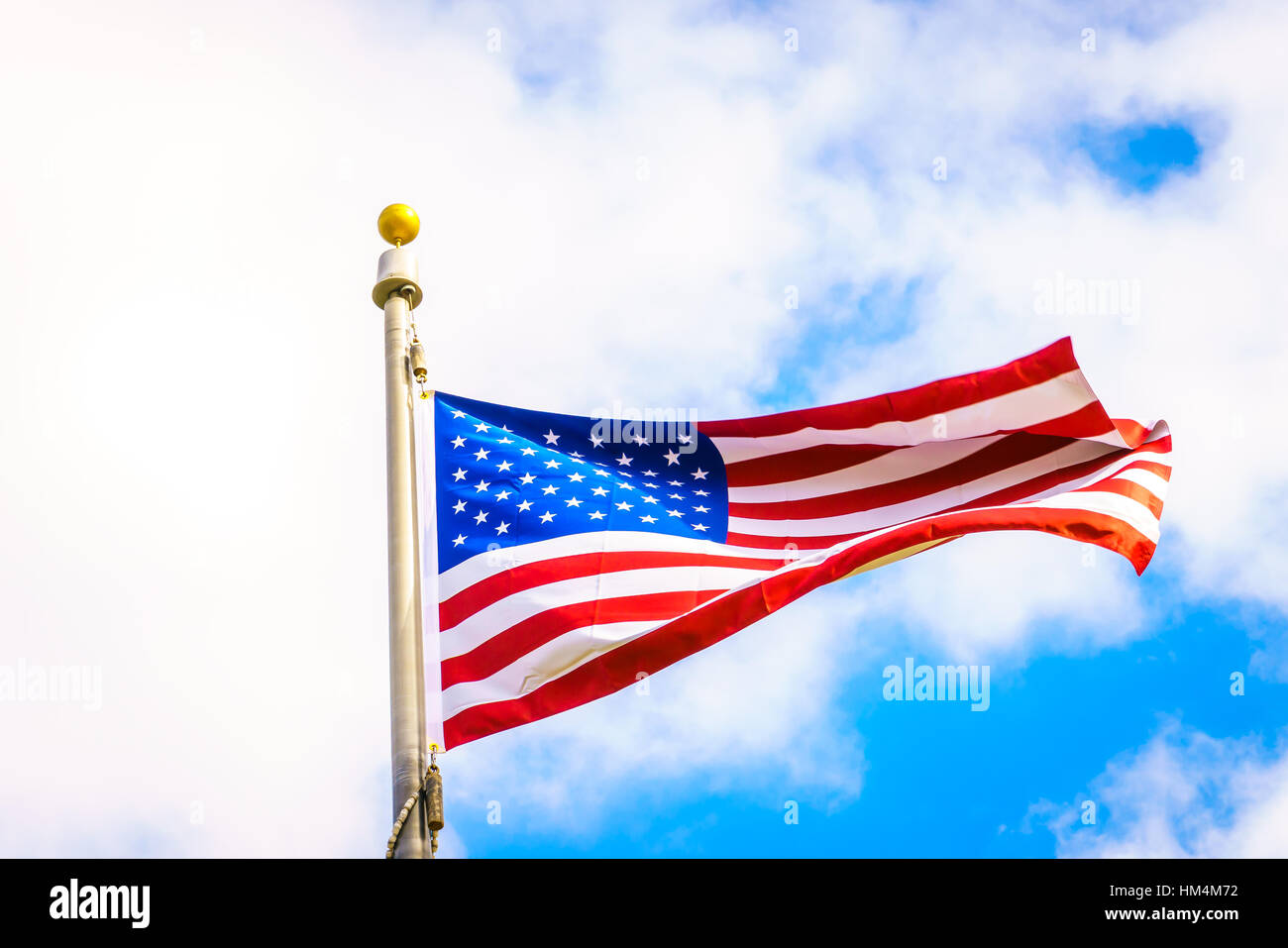 American flag on blue sky Stock Photo - Alamy