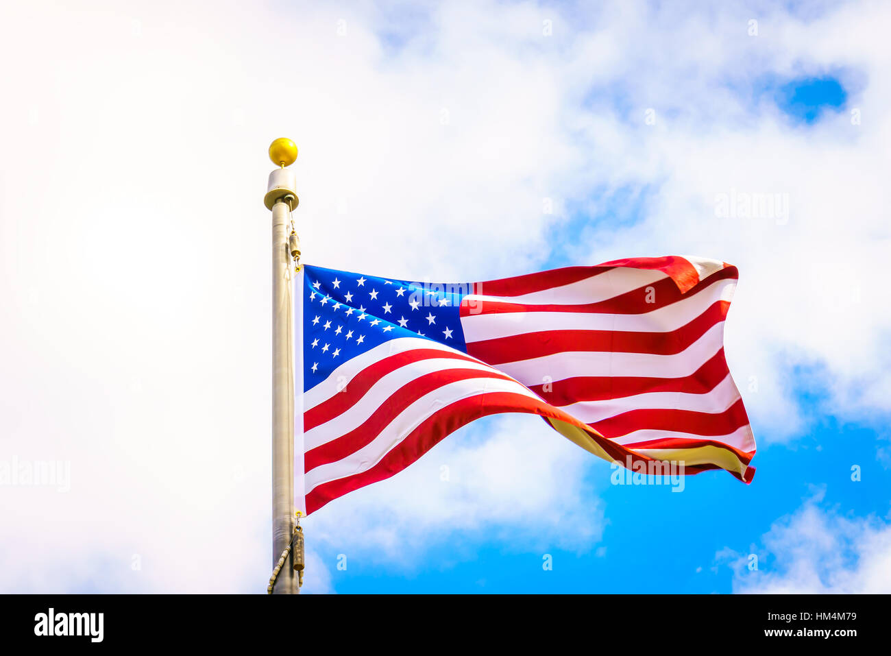 American flag on blue sky Stock Photo - Alamy