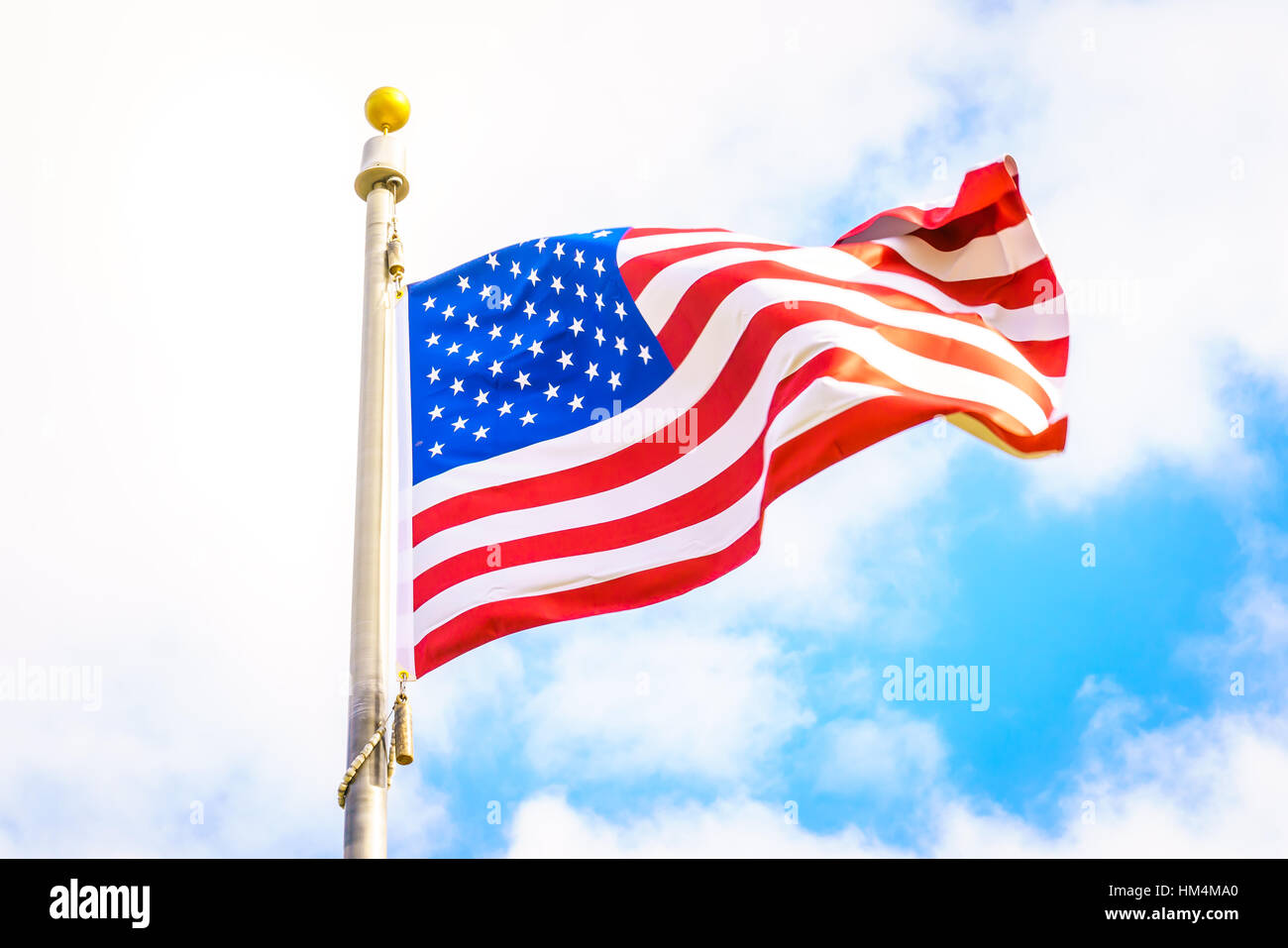 American flag on blue sky Stock Photo - Alamy