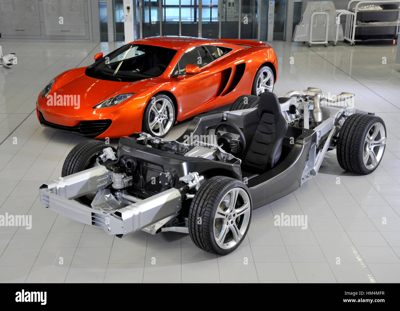 McLaren MP4-12C British super car and bare chassis showing the carbon fibre  tub Stock Photo - Alamy