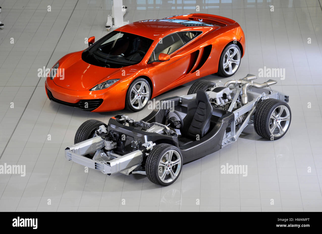 McLaren MP4-12C British super car and bare chassis showing the carbon fibre  tub Stock Photo - Alamy