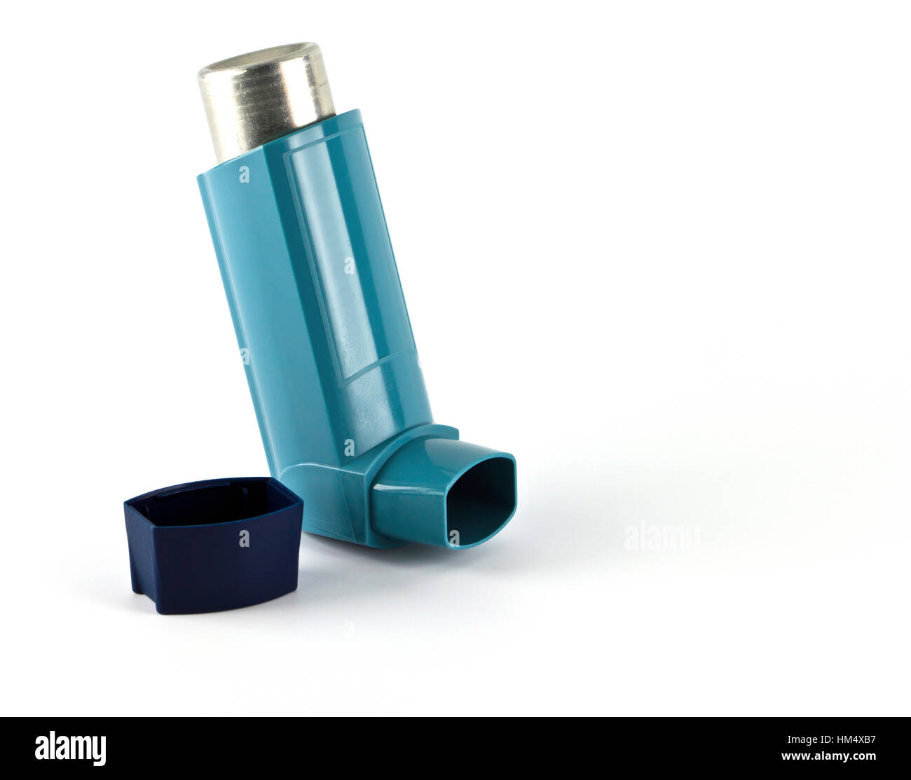 Asthma inhaler isolated on a white background Stock Photo - Alamy