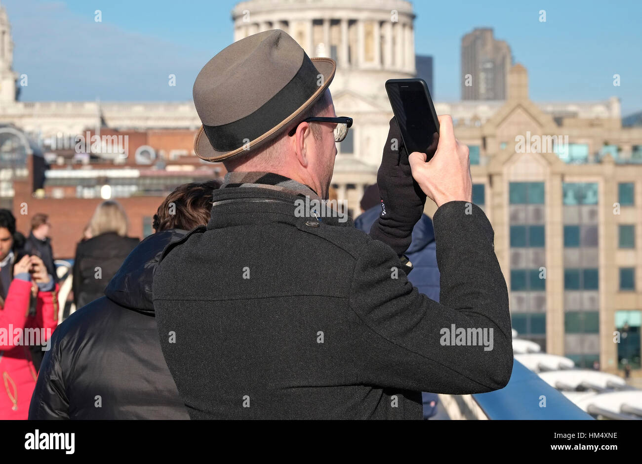 man taking photograph with mobile phone in london, england Stock Photo
