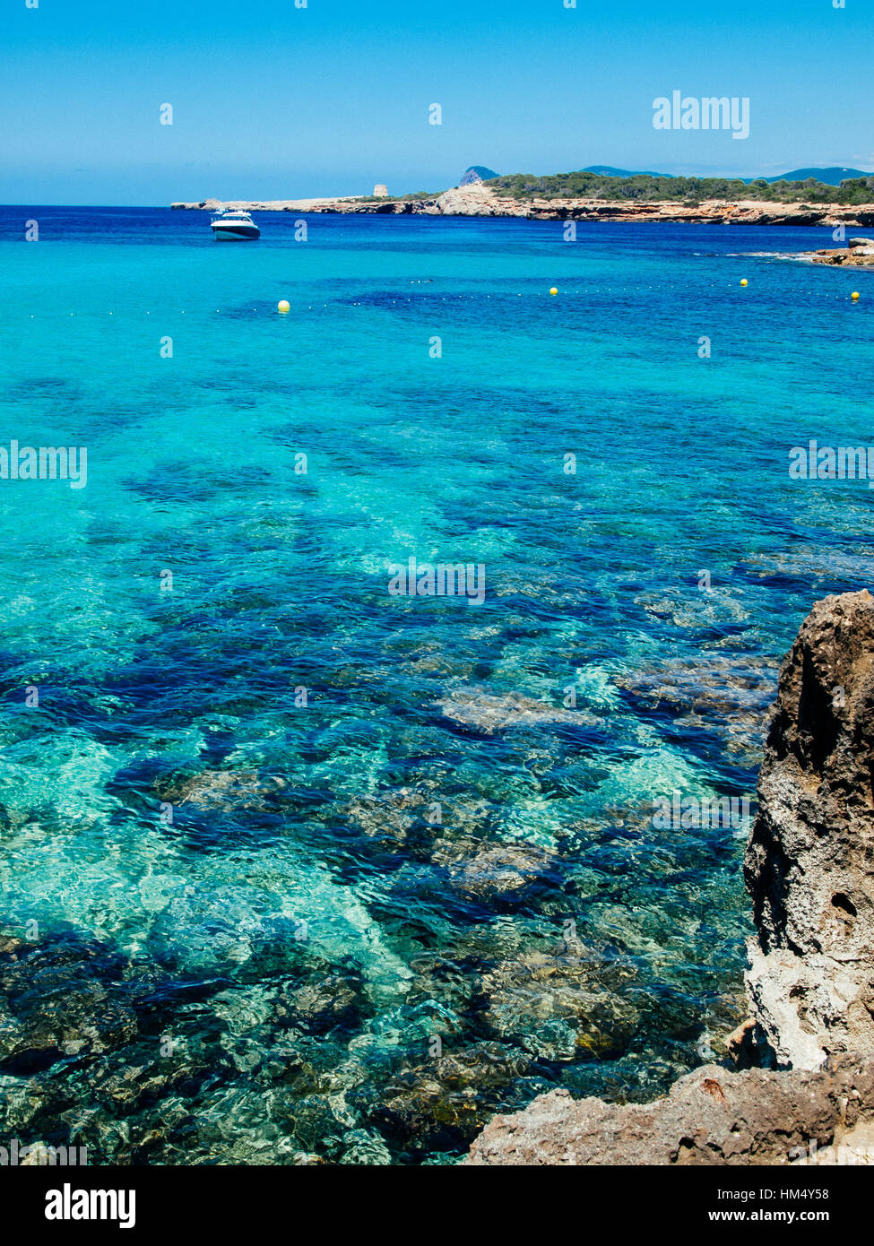 Crystal water in the beach of cala comte near san antoni, Ibiza,Spain Stock Photo
