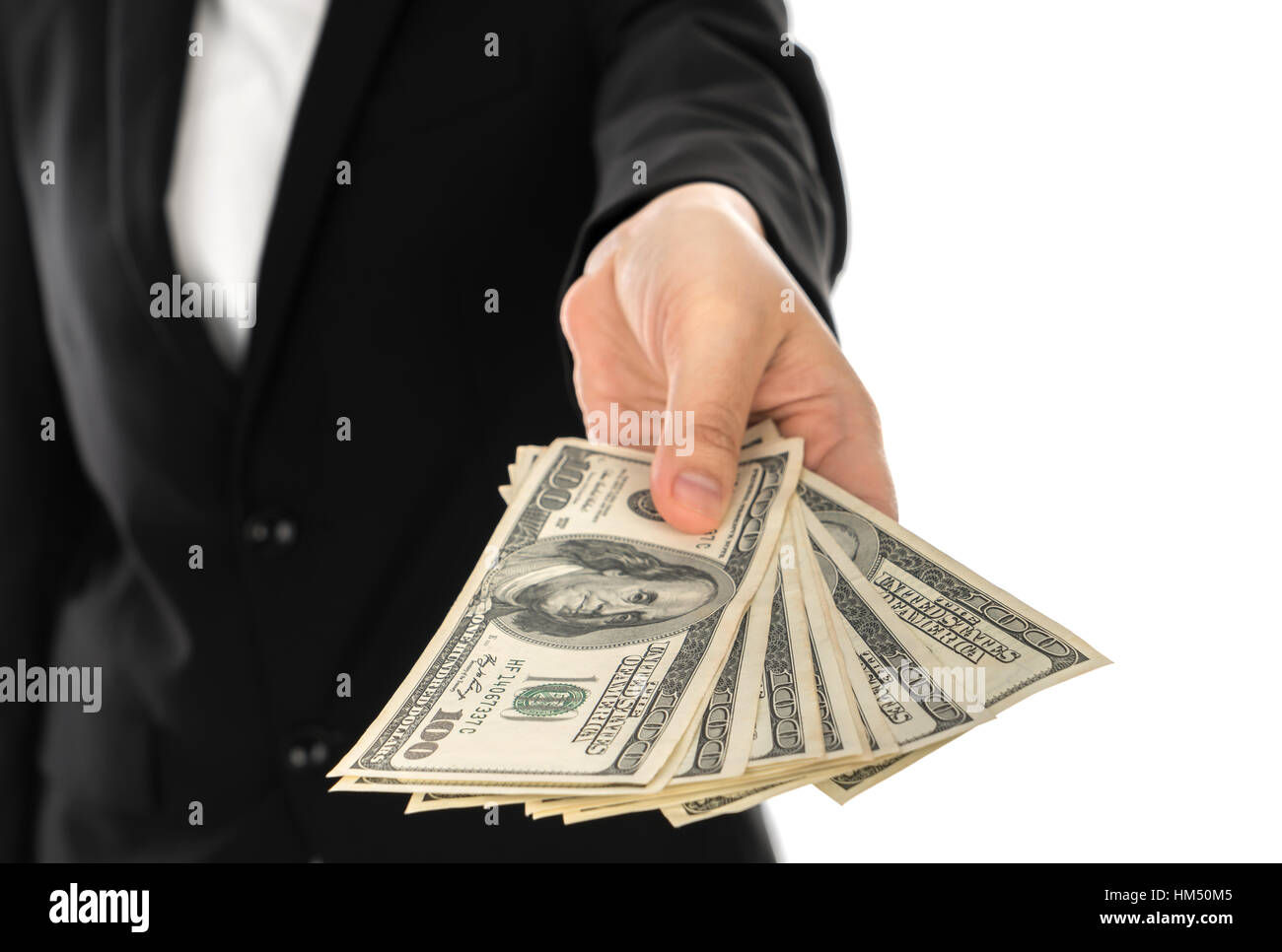 Business man Displaying a Spread of Dollar Stock Photo - Alamy