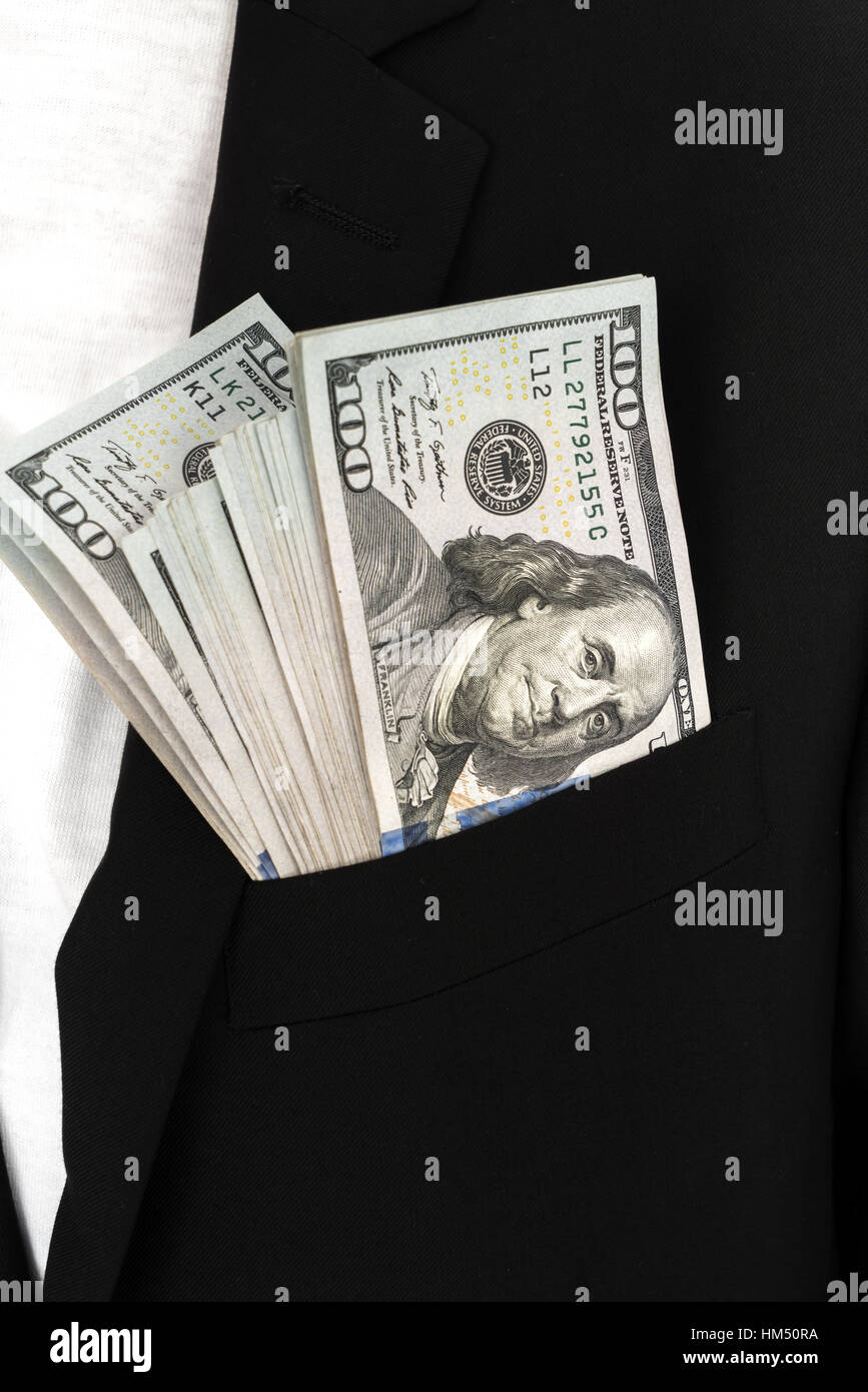 Business man Displaying a Spread of Dollar Stock Photo - Alamy
