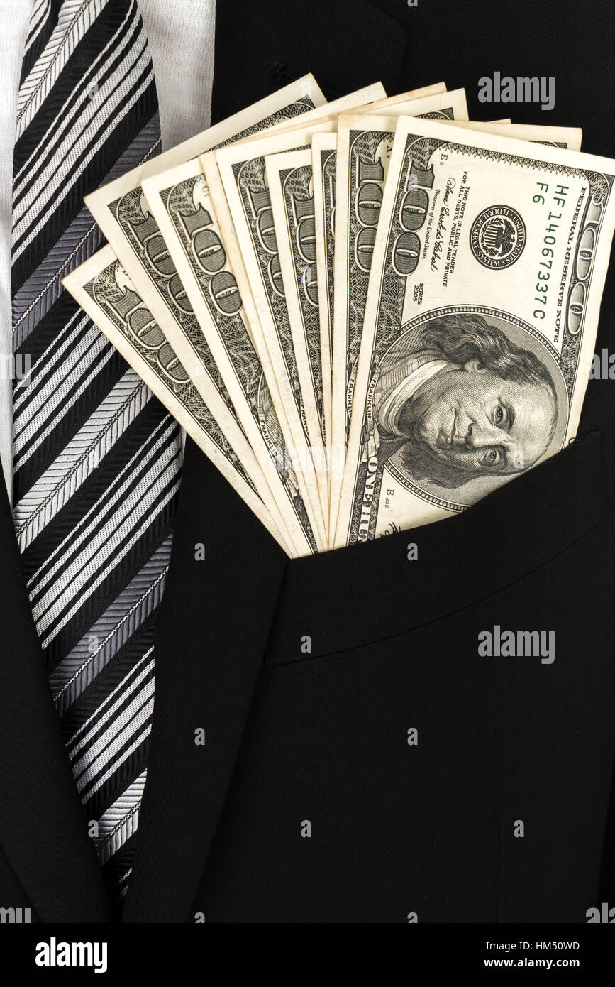 Business man Displaying a Spread of Dollar Stock Photo - Alamy