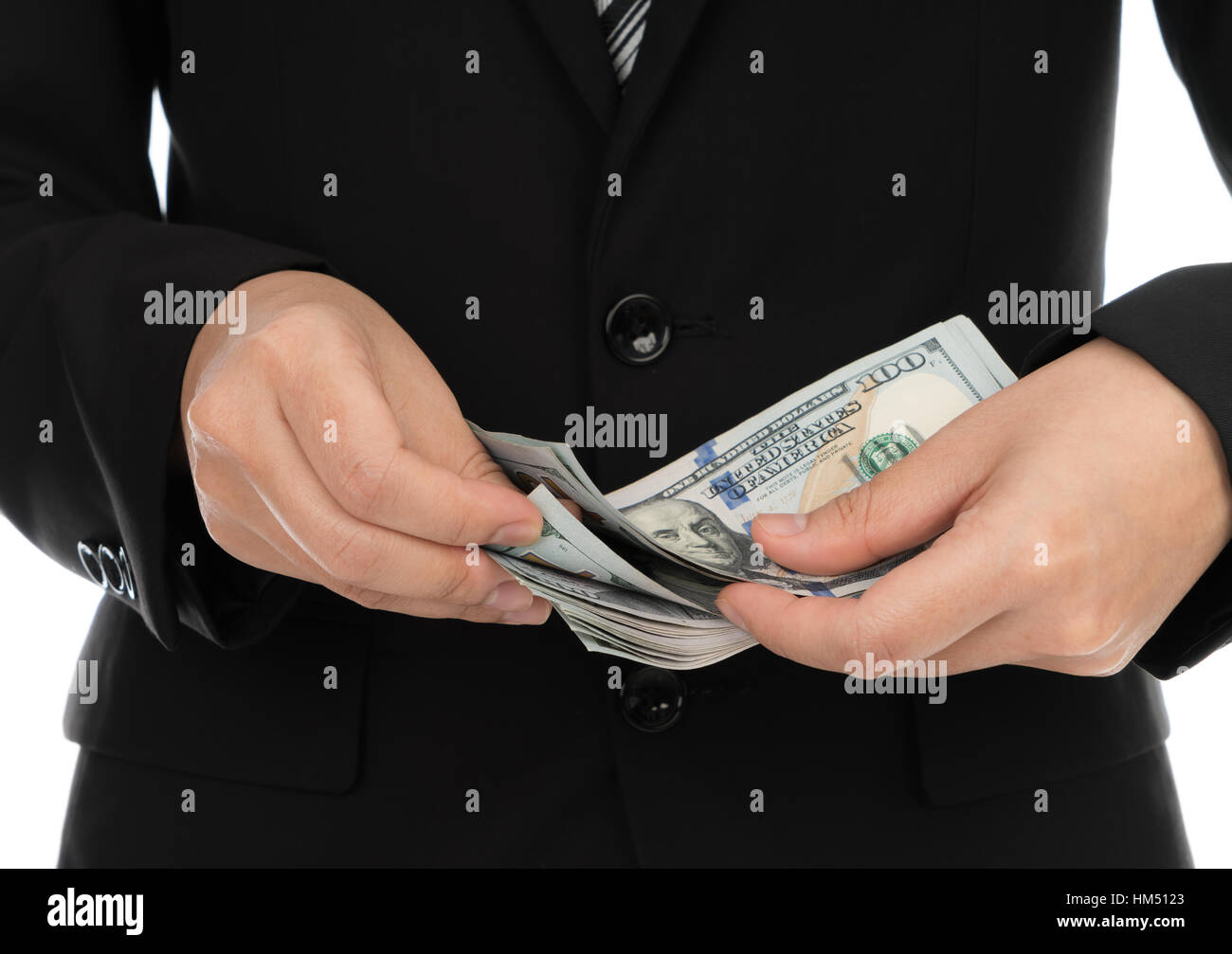 Business man Displaying a Spread of Dollar Stock Photo - Alamy