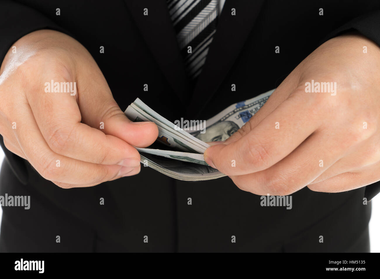 Business man Displaying a Spread of Dollar Stock Photo - Alamy