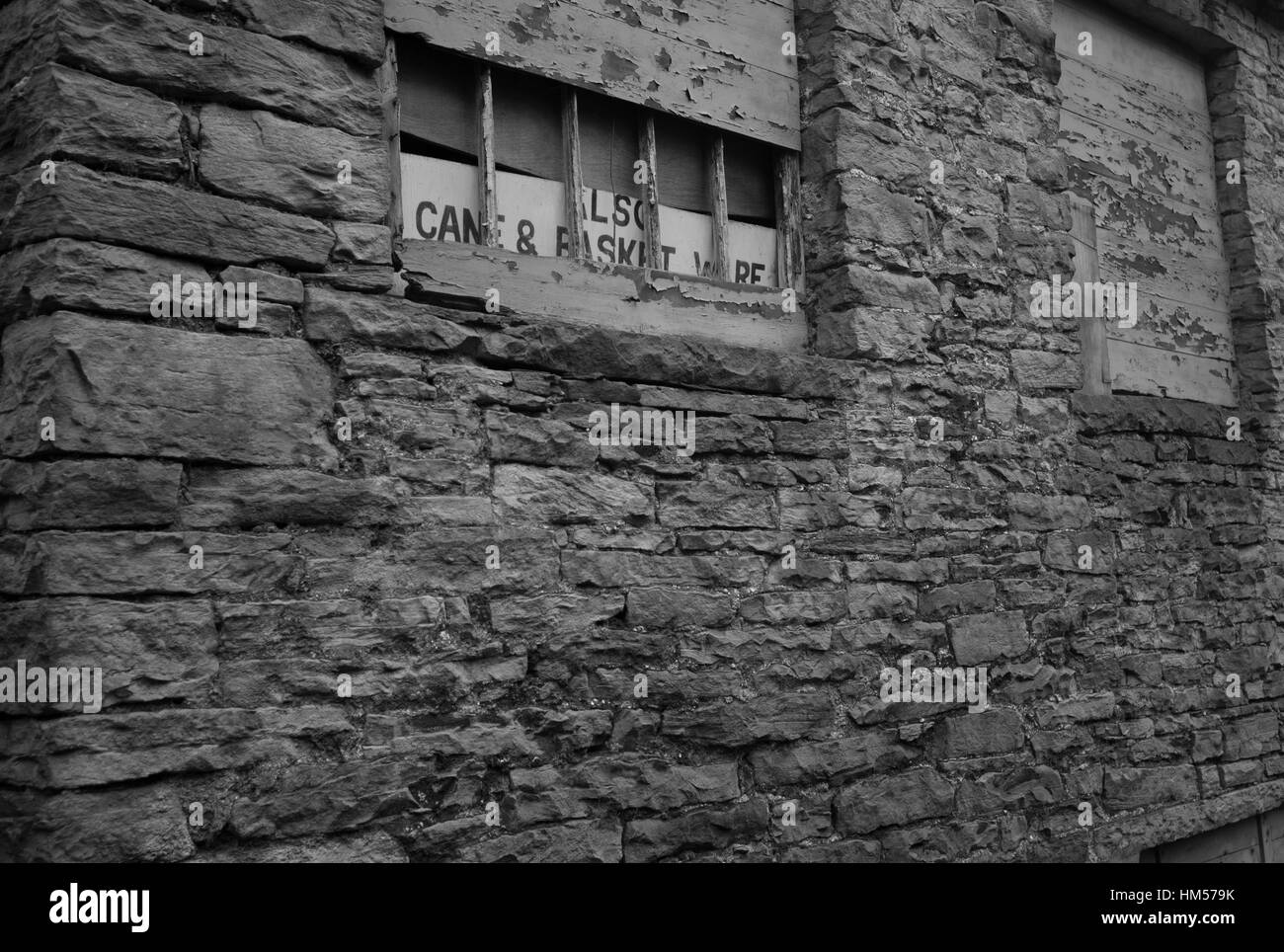 Cane and Basket ware sign in derelict building, Alston, Cumbria Stock