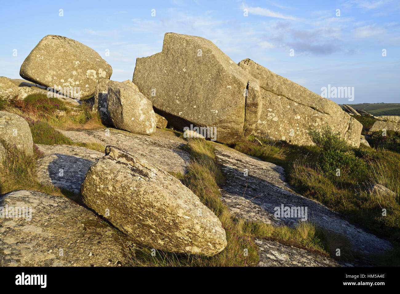 Giant granite blocks forming tors on Amalveor Downs, near Zennor in Penwith, Cornwall. They are near Zennor Quoit and also the south west coast path. Stock Photo