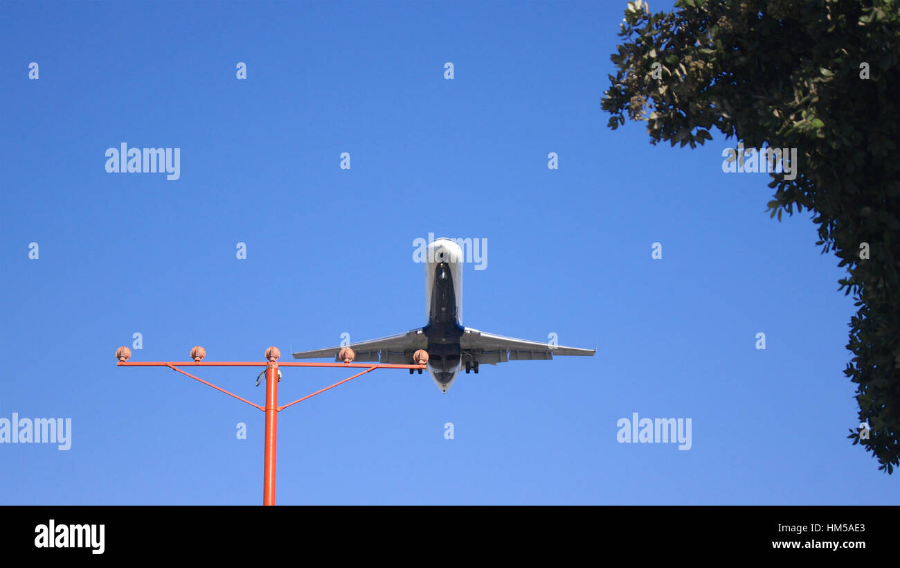 LOS ANGELES, CALIFORNIA, USA - OCT 9th, 2014: airplane shown shortly before landing at the LA Airport LAX. Stock Photo