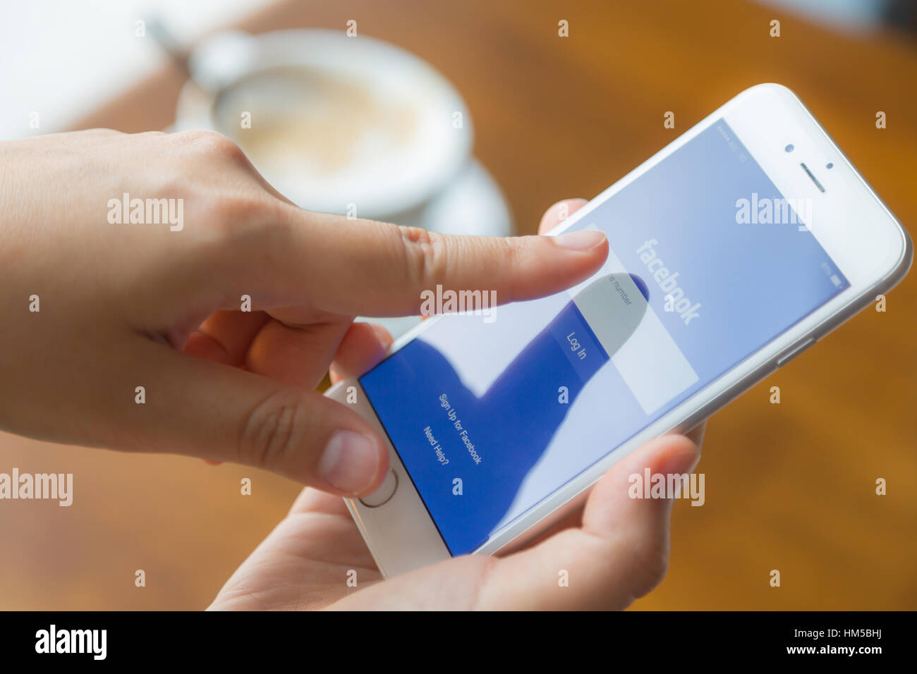 Loei, Thailand - July 12, 2015: Hand holding Iphone with mobile ...