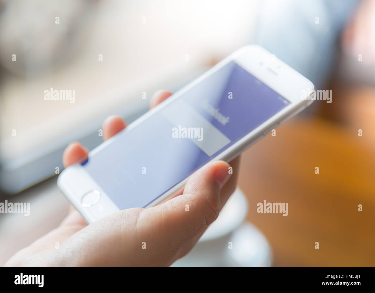 Loei, Thailand - July 12, 2015: Hand holding Iphone with mobile ...