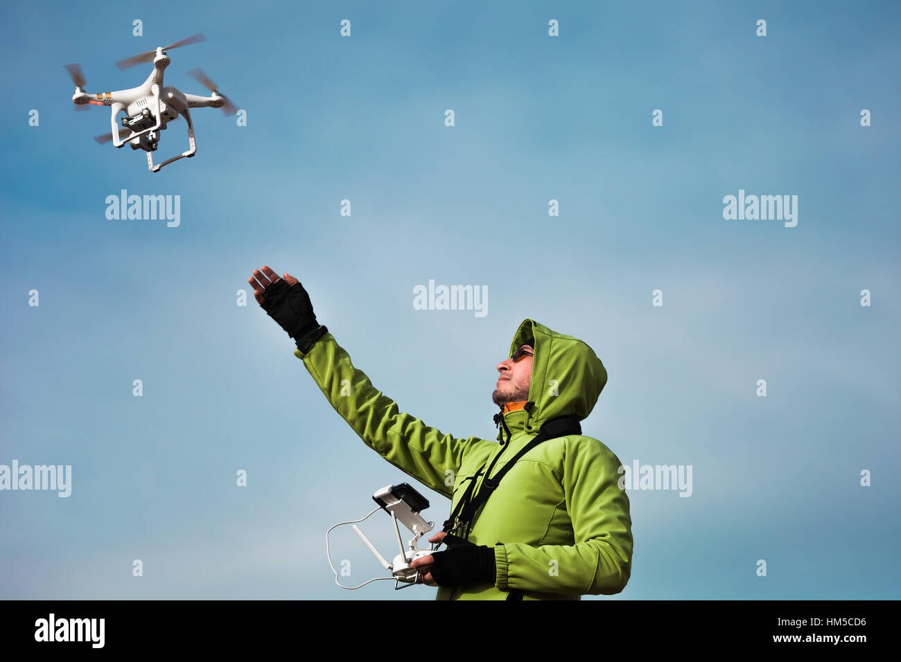Man operating a drone Stock Photo