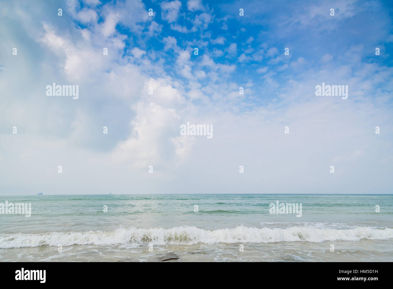 Beach and tropical sea with blue sky Stock Photo - Alamy