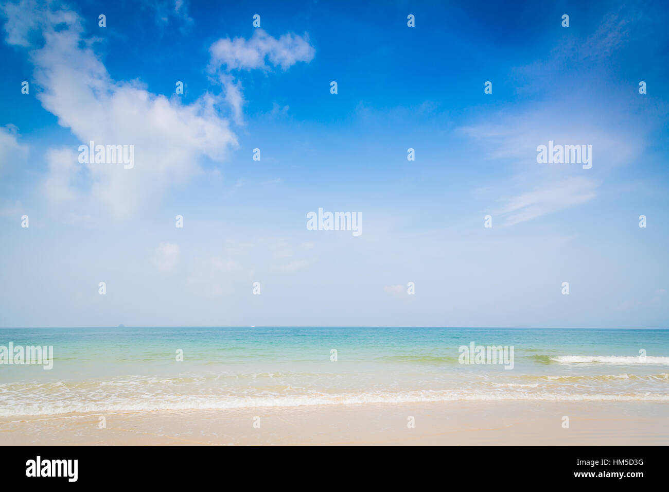 Beach and tropical sea with blue sky Stock Photo - Alamy