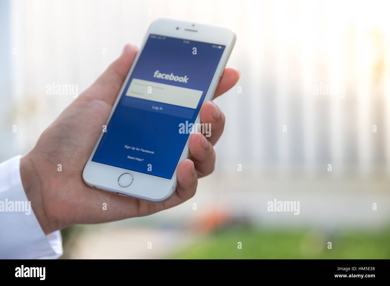 Loei, Thailand - August 12, 2015: Hand holding Iphone with mobile ...