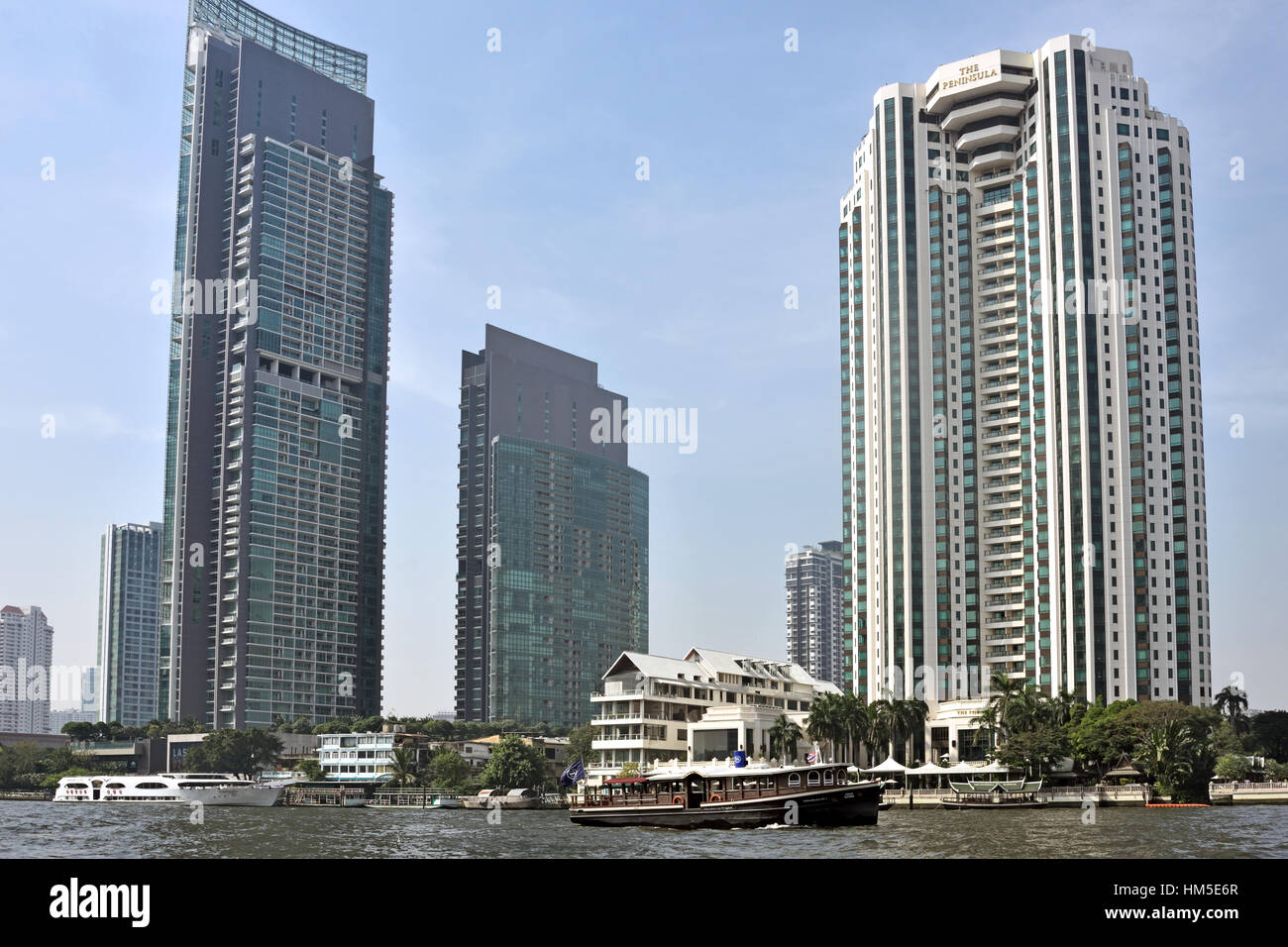 Traffic on the Chao Phraya River and Bangkok skyline Thailand Stock ...