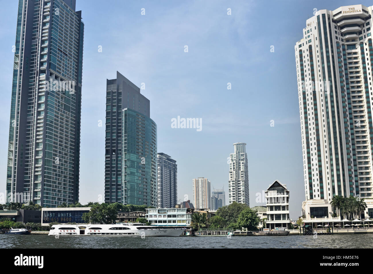 Traffic on the Chao Phraya River and Bangkok skyline Thailand Stock ...