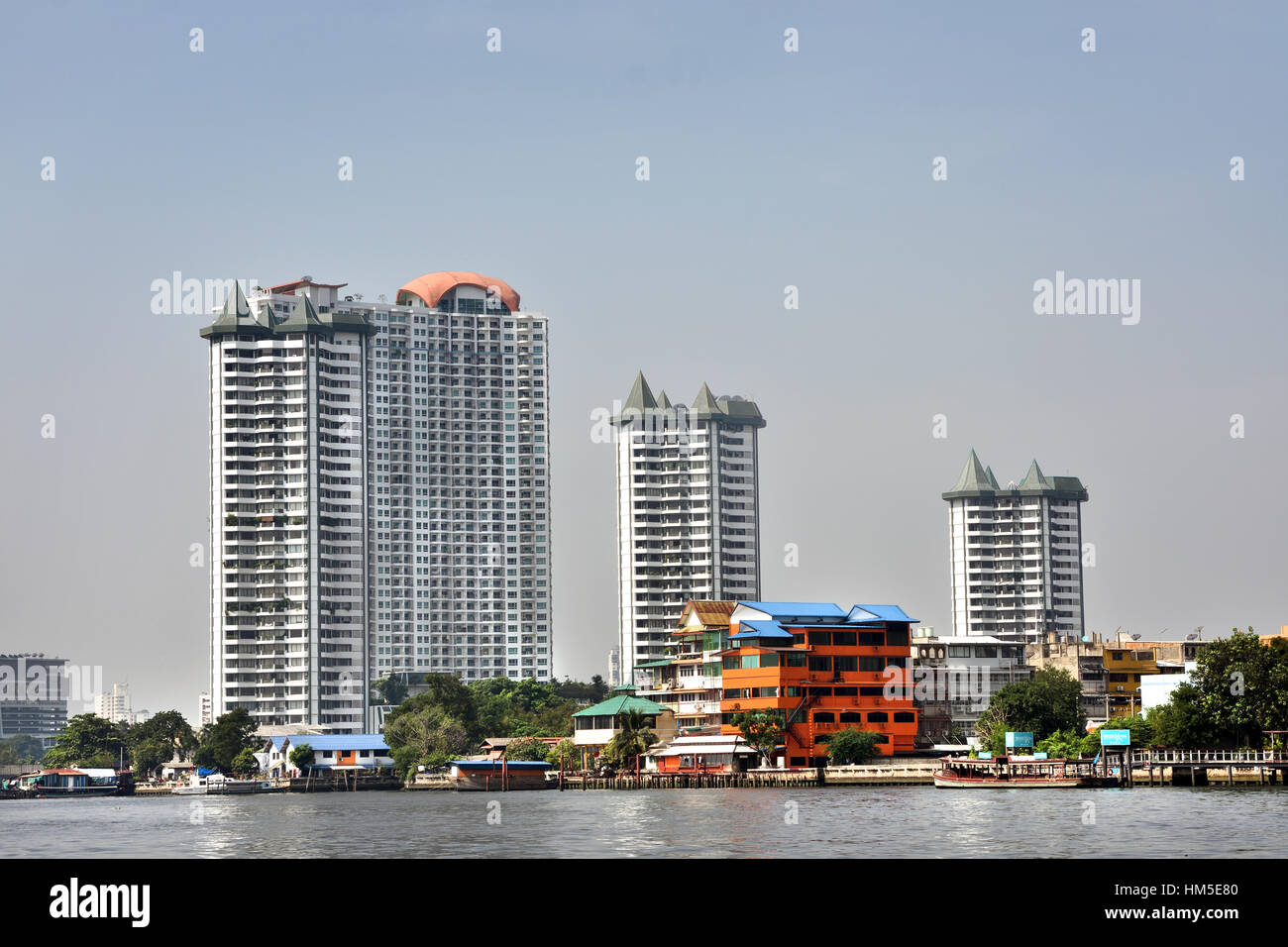 Traffic on the Chao Phraya River and Bangkok skyline Thailand Stock ...