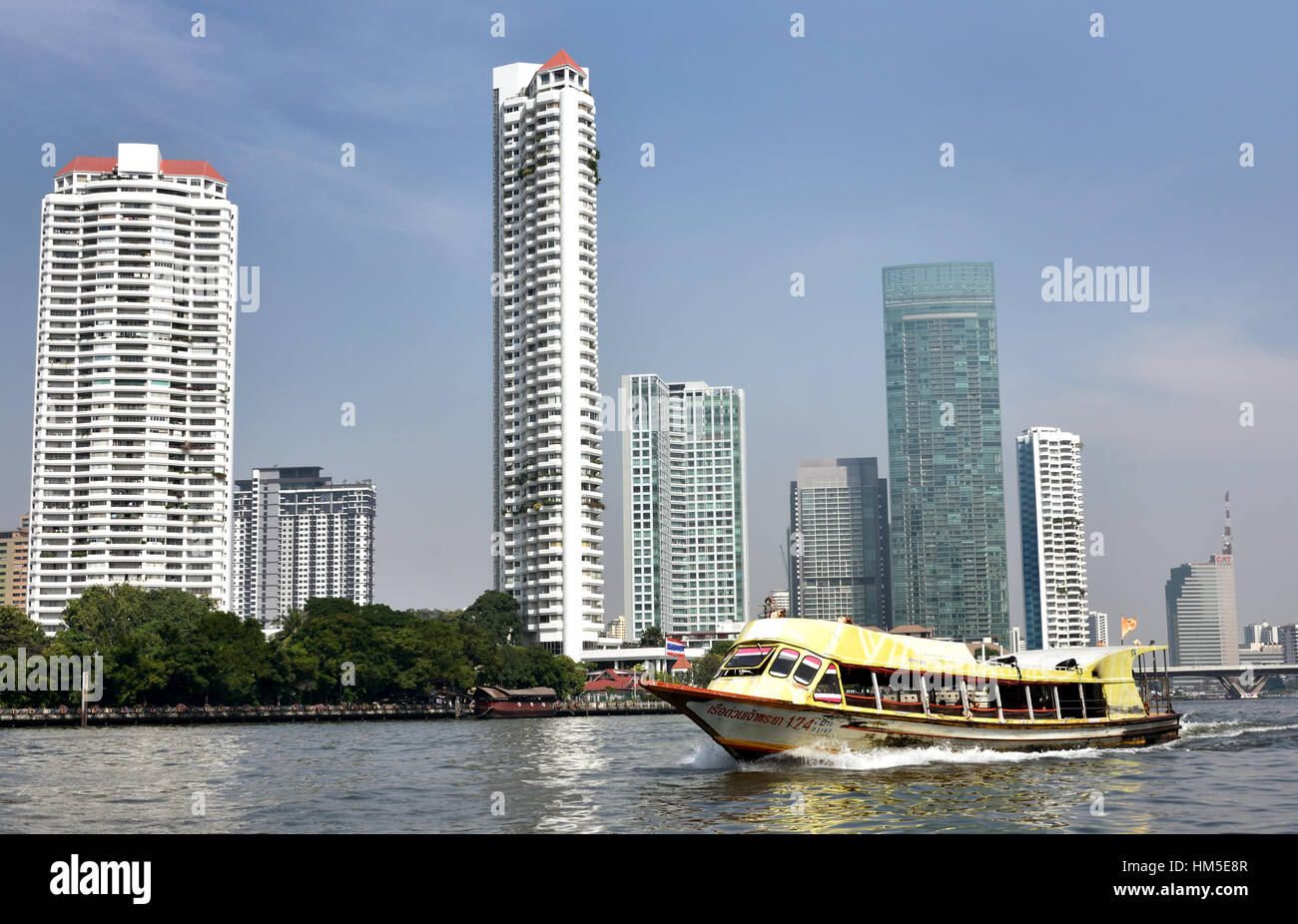 Traffic on the Chao Phraya River and Bangkok skyline Thailand Stock ...