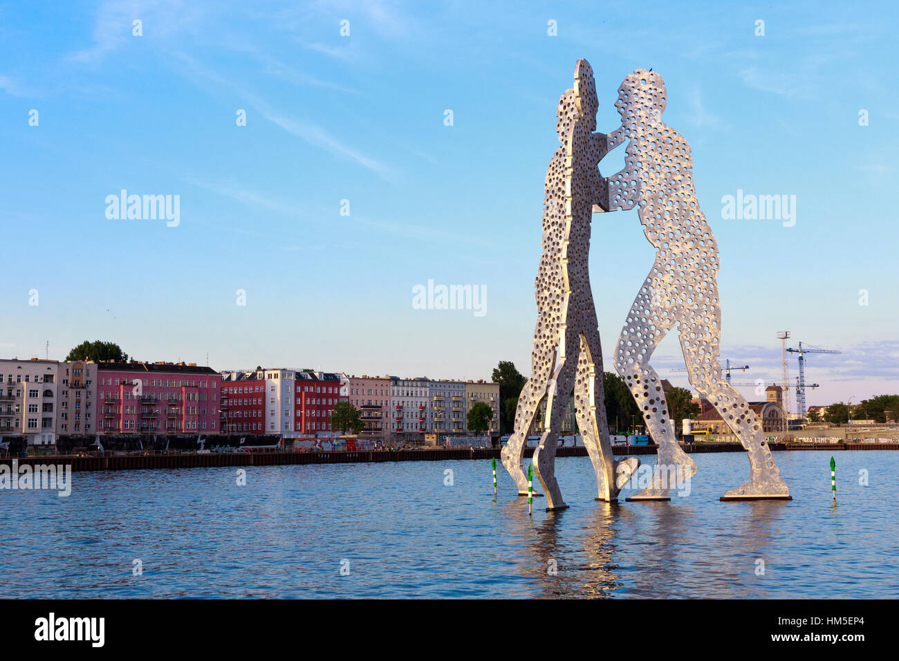BERLIN - MAY 21, 2014: Molecule Man designed by Jonathan Borofsky, on May 21, 2014 in Berlin, Germany. Symbol of the unity of the three restructured i Stock Photo