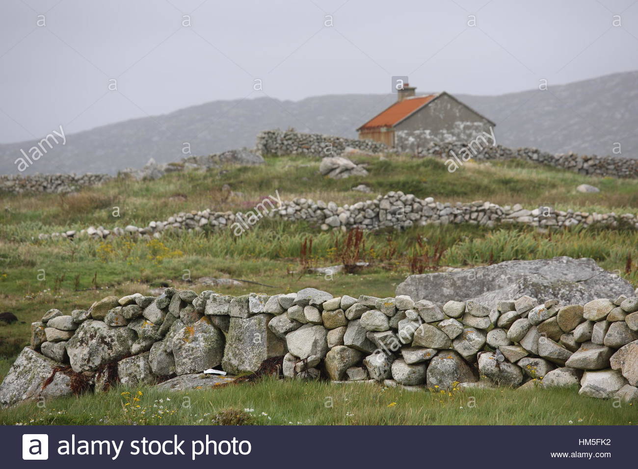 Irish outhouse made of stone and stone walls in Galway, Ireland Stock