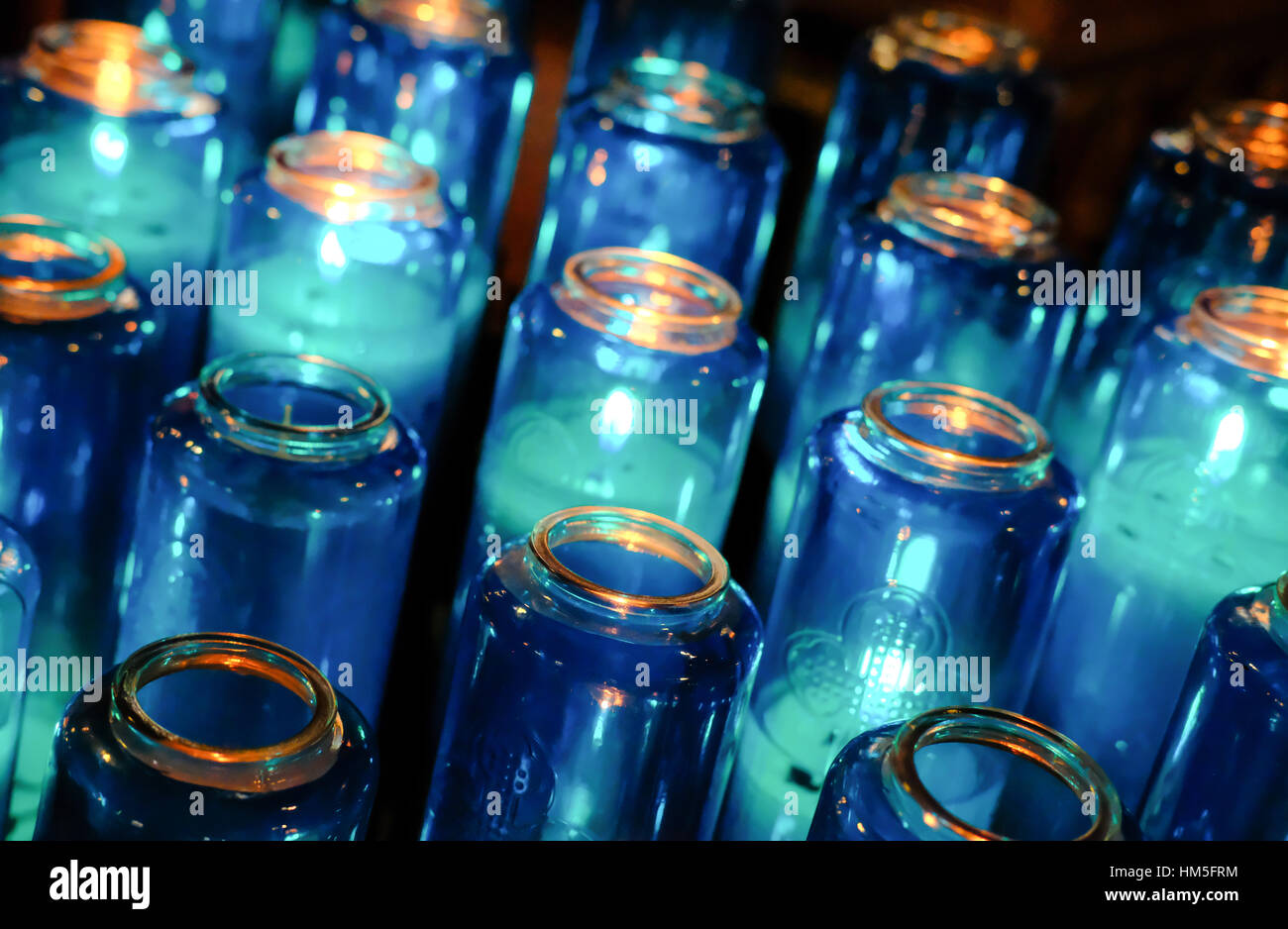 Abstract view of church candles seen lit in a large Canadian church