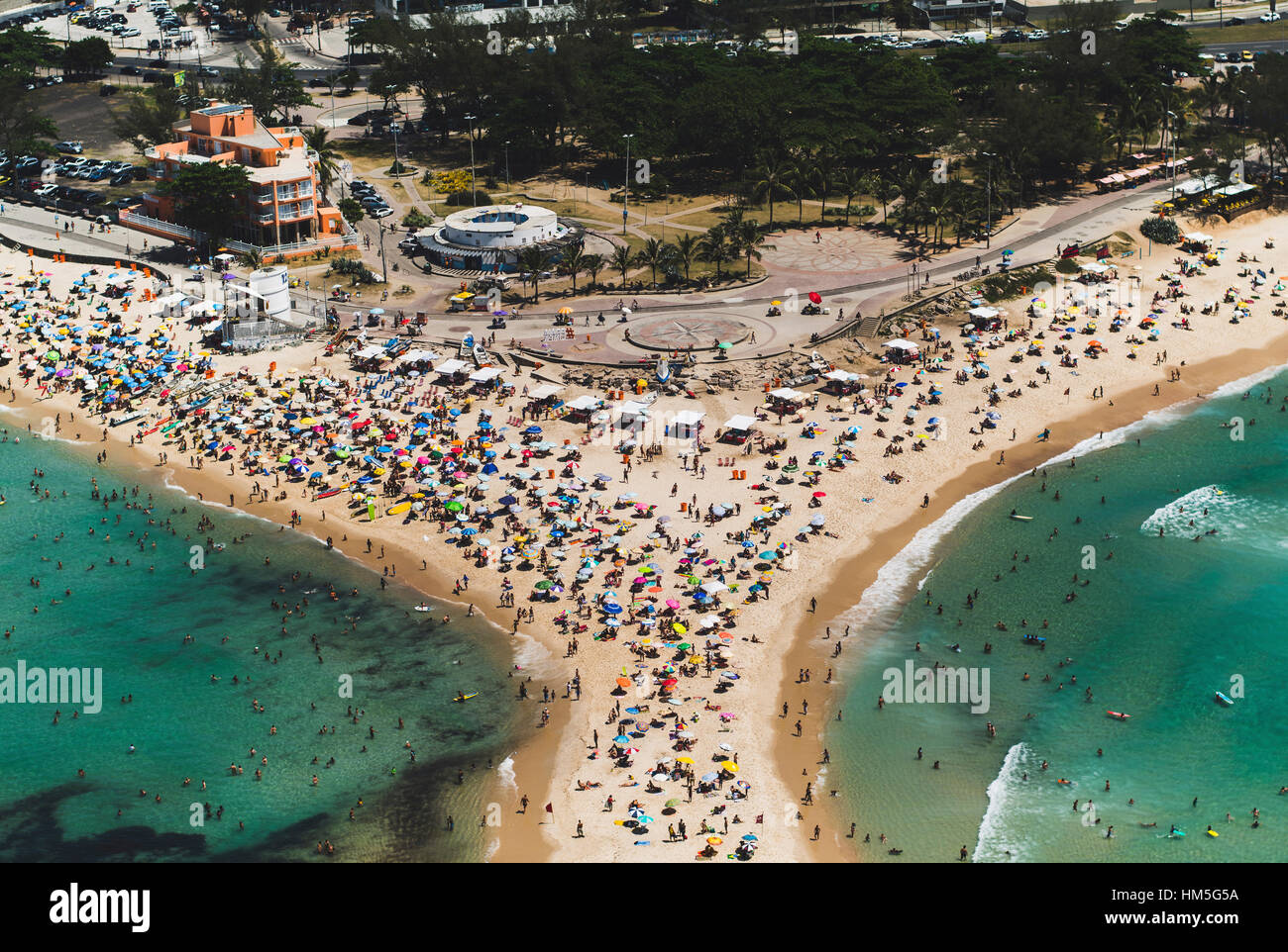 Aerial view of people enjoying at beach in city Stock Photo