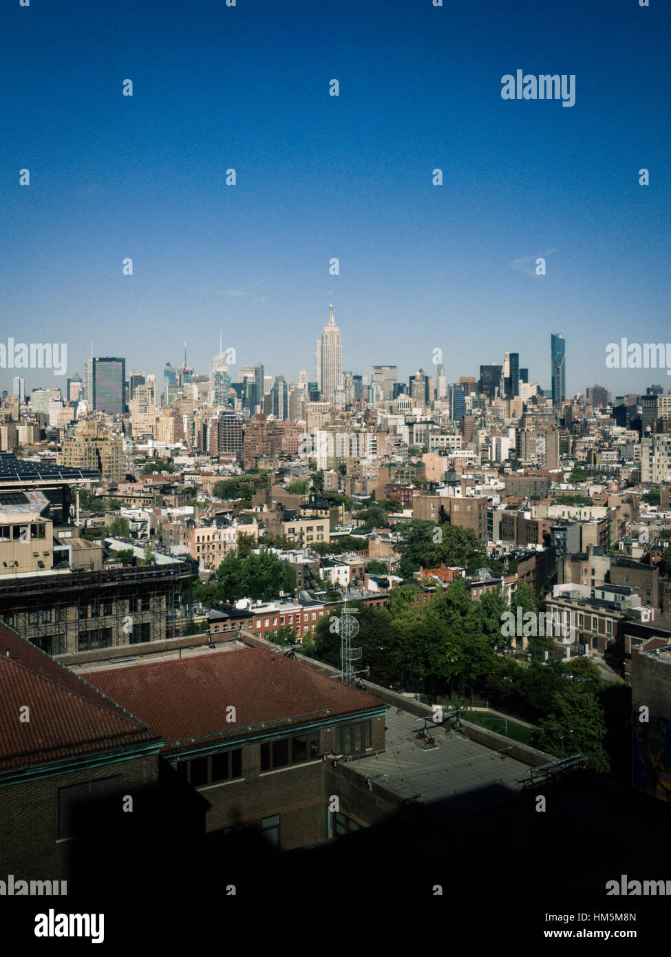 High angle view of cityscape against blue sky Stock Photo